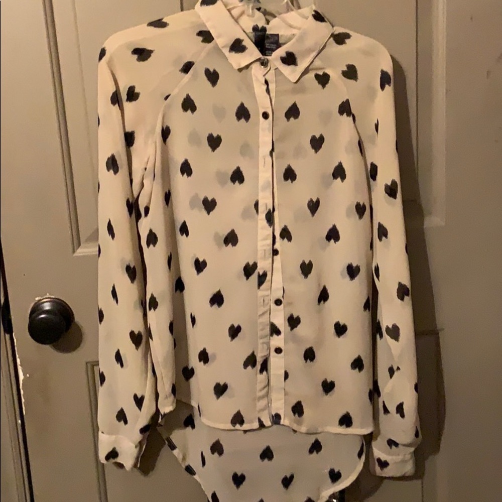 Cream blouse with black hearts